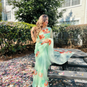 Gulmohar green organza saree